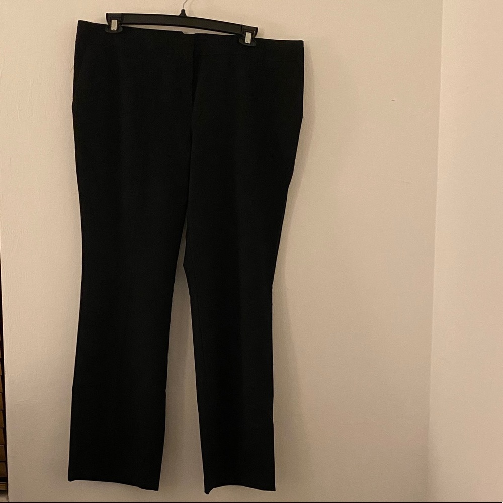 Van Huesen women’s work pants in black.